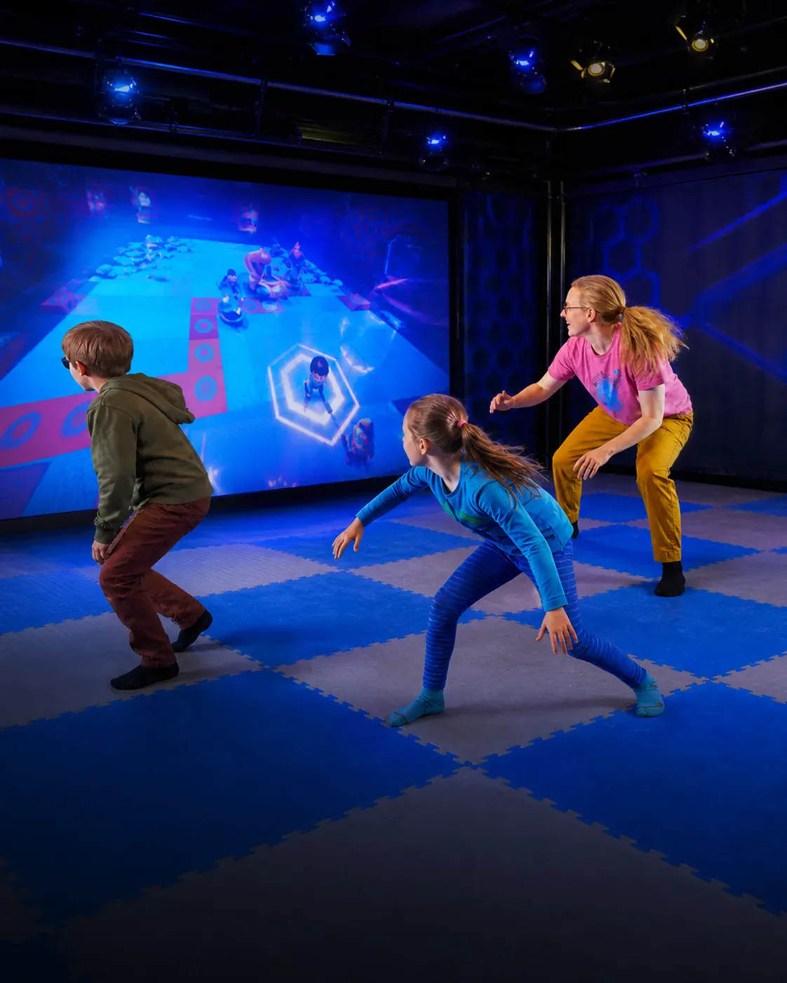 Kids playing on the motion-tracked Valo Arena floor